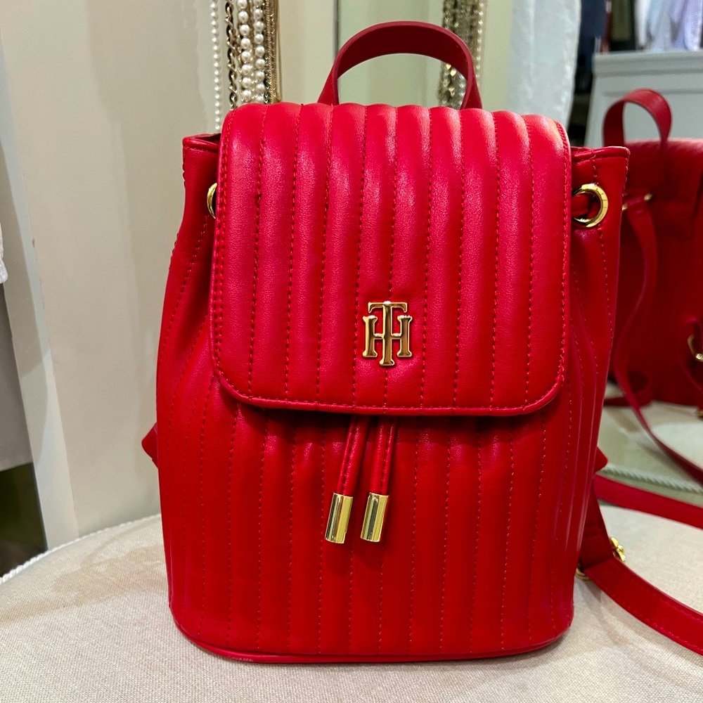 Red faux leather backpack